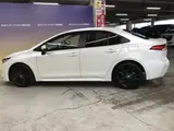 2022 Toyota Corolla 1.8 Hybrid WxB 50 Million Edition E-Four 4WD White Sedan for sale, Japanese used car export - photo 8 of 59 | GULJI TRADERS