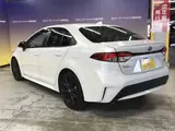 2022 Toyota Corolla 1.8 Hybrid WxB 50 Million Edition E-Four 4WD White Sedan for sale, Japanese used car export - photo 10 of 59 | GULJI TRADERS