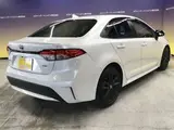 2022 Toyota Corolla 1.8 Hybrid WxB 50 Million Edition E-Four 4WD White Sedan for sale, Japanese used car export - photo 11 of 59 | GULJI TRADERS