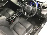 2022 Toyota Corolla 1.8 Hybrid WxB 50 Million Edition E-Four 4WD White Sedan for sale, Japanese used car export - photo 12 of 59 | GULJI TRADERS