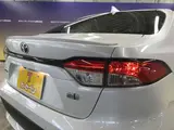 2022 Toyota Corolla 1.8 Hybrid WxB 50 Million Edition E-Four 4WD White Sedan for sale, Japanese used car export - photo 50 of 59 | GULJI TRADERS
