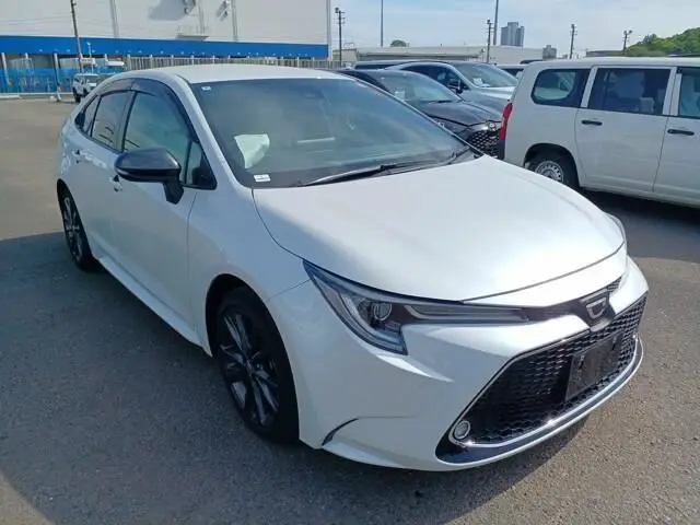 2022 Toyota Corolla Double Bye Pearl Sedan for sale, Japanese used car export - photo 1 of 28 | GULJI TRADERS