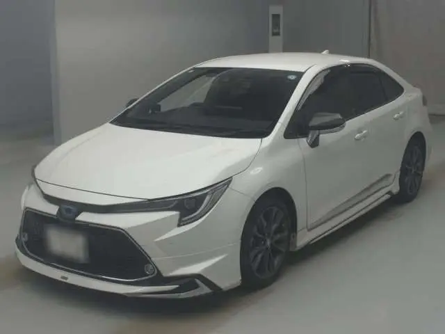2022 Toyota Corolla Hybrid WXB 4WD Pearl Sedan for sale, Japanese used car export - photo 1 of 9 | GULJI TRADERS