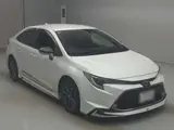 2022 Toyota Corolla Hybrid WXB 4WD Pearl Sedan for sale, Japanese used car export - photo 3 of 9 | GULJI TRADERS