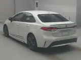 2022 Toyota Corolla Hybrid WXB 4WD Pearl Sedan for sale, Japanese used car export - photo 4 of 9 | GULJI TRADERS