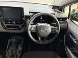 2022 Toyota Corolla Hybrid WXB 4WD Pearl Sedan for sale, Japanese used car export - photo 7 of 9 | GULJI TRADERS