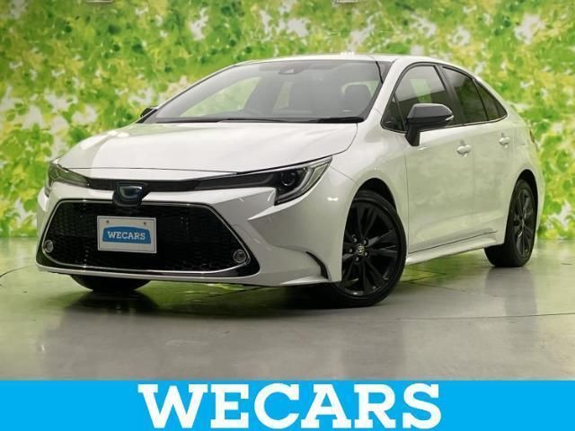 2022 Toyota Corolla Hybrid Sedan for sale, Japanese used car export - photo 1 of 9 | GULJI TRADERS