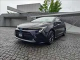 2023 Toyota Corolla Hybrid W×B 4WD Black Sedan for sale, Japanese used car export - photo 1 of 20 | GULJI TRADERS
