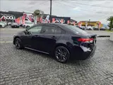 2023 Toyota Corolla Hybrid W×B 4WD Black Sedan for sale, Japanese used car export - photo 2 of 20 | GULJI TRADERS