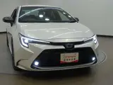 2023 Toyota Corolla 1.8 Hybrid WxB Pearl Sedan for sale, Japanese used car export - photo 25 of 33 | GULJI TRADERS