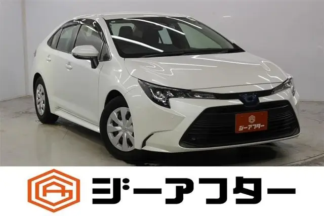 2023 Toyota Corolla 1.8 HYBRID X White Sedan for sale, Japanese used car export | GULJI TRADERS