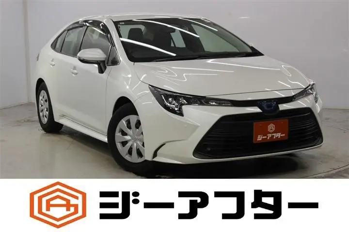 2023 Toyota Corolla 1.8 HYBRID X White Sedan for sale, Japanese used car export - photo 1 of 30 | GULJI TRADERS