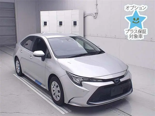 2023 Toyota Corolla 4WD Hybrid G Silver Sedan for sale, Japanese used car export - photo 1 of 12 | GULJI TRADERS