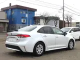 2023 Toyota Corolla Hybrid G Pearl Sedan for sale, Japanese used car export - photo 2 of 19 | GULJI TRADERS