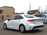 2023 Toyota Corolla Hybrid G Pearl Sedan for sale, Japanese used car export - photo 5 of 19 | GULJI TRADERS