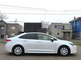 2023 Toyota Corolla Hybrid G Pearl Sedan for sale, Japanese used car export - photo 7 of 19 | GULJI TRADERS