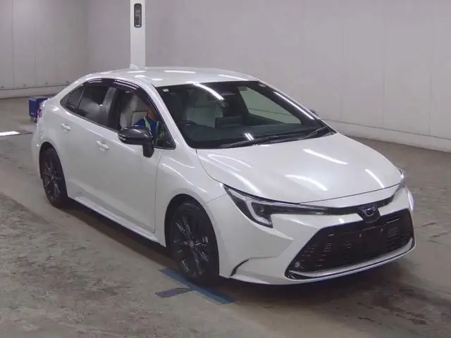 2023 Toyota Corolla Double Bye - photo 1 2023 Toyota Corolla Double Bye Pearl Sedan for sale, Japanese used car export - photo 1 of 5 | GULJI TRADERS