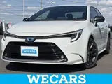 2023 Toyota Corolla Hybrid Double By White Sedan for sale, Japanese used car export - photo 1 of 9 | GULJI TRADERS