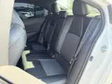 2023 Toyota Corolla Hybrid Double By White Sedan for sale, Japanese used car export - photo 7 of 9 | GULJI TRADERS