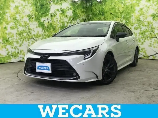 2023 Toyota Corolla Double Bye - photo 1 2023 Toyota Corolla Double Bye White Sedan for sale, Japanese used car export - photo 1 of 9 | GULJI TRADERS
