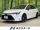 2023 Toyota Corolla Hybrid Double By White Sedan for sale, Japanese used car export - photo 1 of 9 | GULJI TRADERS