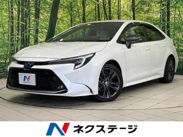 2023 Toyota Corolla Hybrid Double By White Sedan for sale, Japanese used car export | GULJI TRADERS