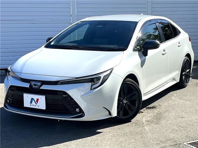 2024 Toyota Corolla Hybrid - photo 1 2024 Toyota Corolla Hybrid Sedan for sale, Japanese used car export - photo 1 of 30 | GULJI TRADERS