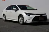 2024 Toyota Corolla 1.8 HYBRID G White Sedan for sale, Japanese used car export - photo 3 of 30 | GULJI TRADERS