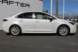 2024 Toyota Corolla 1.8 HYBRID G White Sedan for sale, Japanese used car export - photo 4 of 30 | GULJI TRADERS