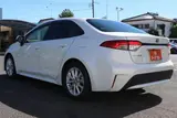 2024 Toyota Corolla 1.8 HYBRID G White Sedan for sale, Japanese used car export - photo 7 of 30 | GULJI TRADERS