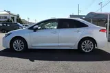 2024 Toyota Corolla 1.8 HYBRID G White Sedan for sale, Japanese used car export - photo 8 of 30 | GULJI TRADERS