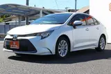 2024 Toyota Corolla 1.8 HYBRID G White Sedan for sale, Japanese used car export - photo 9 of 30 | GULJI TRADERS