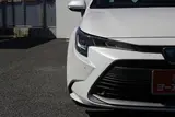 2024 Toyota Corolla 1.8 HYBRID G White Sedan for sale, Japanese used car export - photo 12 of 30 | GULJI TRADERS
