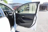 2024 Toyota Corolla 1.8 HYBRID G White Sedan for sale, Japanese used car export - photo 24 of 30 | GULJI TRADERS