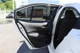 2024 Toyota Corolla 1.8 HYBRID G White Sedan for sale, Japanese used car export - photo 28 of 30 | GULJI TRADERS