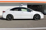 2024 Toyota Corolla 1.8 HYBRID WxB 4WD Sedan for sale, Japanese used car export - photo 10 of 30 | GULJI TRADERS