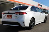 2024 Toyota Corolla 1.8 HYBRID WxB 4WD Sedan for sale, Japanese used car export - photo 11 of 30 | GULJI TRADERS