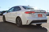 2024 Toyota Corolla 1.8 HYBRID WxB 4WD Sedan for sale, Japanese used car export - photo 13 of 30 | GULJI TRADERS