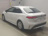 2024 Toyota Corolla Hybrid G Pearl Sedan for sale, Japanese used car export - photo 4 of 9 | GULJI TRADERS