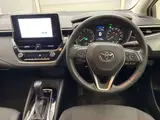 2024 Toyota Corolla Hybrid G Pearl Sedan for sale, Japanese used car export - photo 6 of 9 | GULJI TRADERS