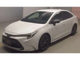 2024 Toyota Corolla Hybrid Sedan for sale, Japanese used car export - photo 1 of 3 | GULJI TRADERS