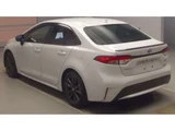 2024 Toyota Corolla Hybrid Sedan for sale, Japanese used car export - photo 2 of 3 | GULJI TRADERS