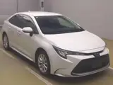 2024 Toyota Corolla Hybrid G Pearl Sedan for sale, Japanese used car export - photo 1 of 9 | GULJI TRADERS