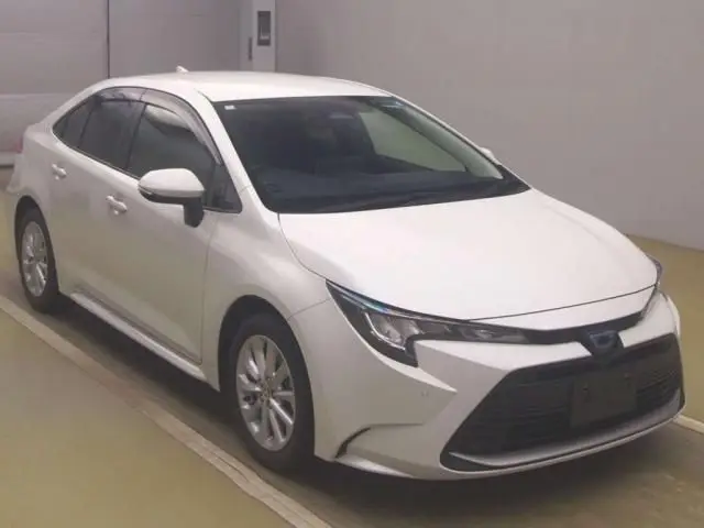 2024 Toyota Corolla Hybrid G - photo 1 2024 Toyota Corolla Hybrid G Pearl Sedan for sale, Japanese used car export - photo 1 of 9 | GULJI TRADERS