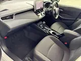 2024 Toyota Corolla Hybrid G Pearl Sedan for sale, Japanese used car export - photo 4 of 9 | GULJI TRADERS