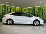 2025 Toyota Corolla Hybrid G Pearl Sedan for sale, Japanese used car export - photo 9 of 30 | GULJI TRADERS