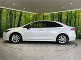 2025 Toyota Corolla Hybrid G Pearl Sedan for sale, Japanese used car export - photo 13 of 30 | GULJI TRADERS