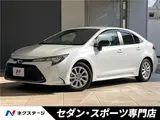 2025 Toyota Corolla Hybrid G Pearl Sedan for sale, Japanese used car export - photo 4 of 30 | GULJI TRADERS