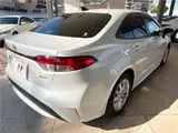 2025 Toyota Corolla Hybrid G Pearl Sedan for sale, Japanese used car export - photo 11 of 30 | GULJI TRADERS