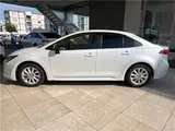2025 Toyota Corolla Hybrid G Pearl Sedan for sale, Japanese used car export - photo 14 of 30 | GULJI TRADERS